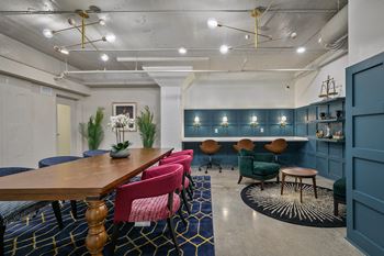 Coworking lounge with conference table and seating areas
